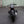 photo du derrière d'une moto toute noire bmw cafe racer